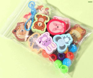 Lojë me figura kafshësh me kalim në fill