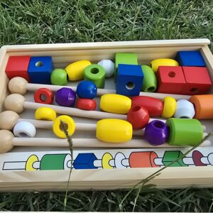 Kalimi i rruazave te drurit në fill (shkop) “Sugar Guard Beading”